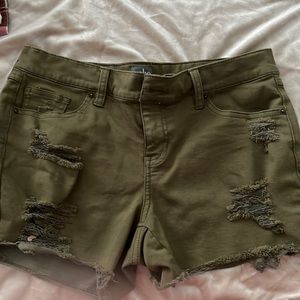 Distressed olive green denim shorts